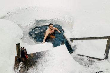 ice hole swimming Estonia credits Rauno Liivand